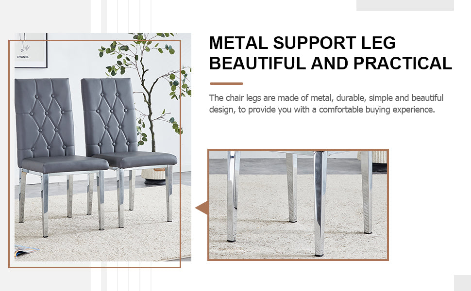 Two grey tufted dining chairs with shiny metal legs