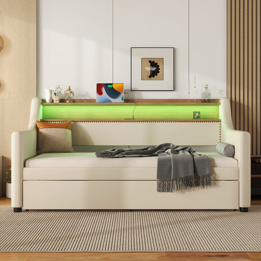 Cream upholstered daybed with integrated shelf and green LED lighting