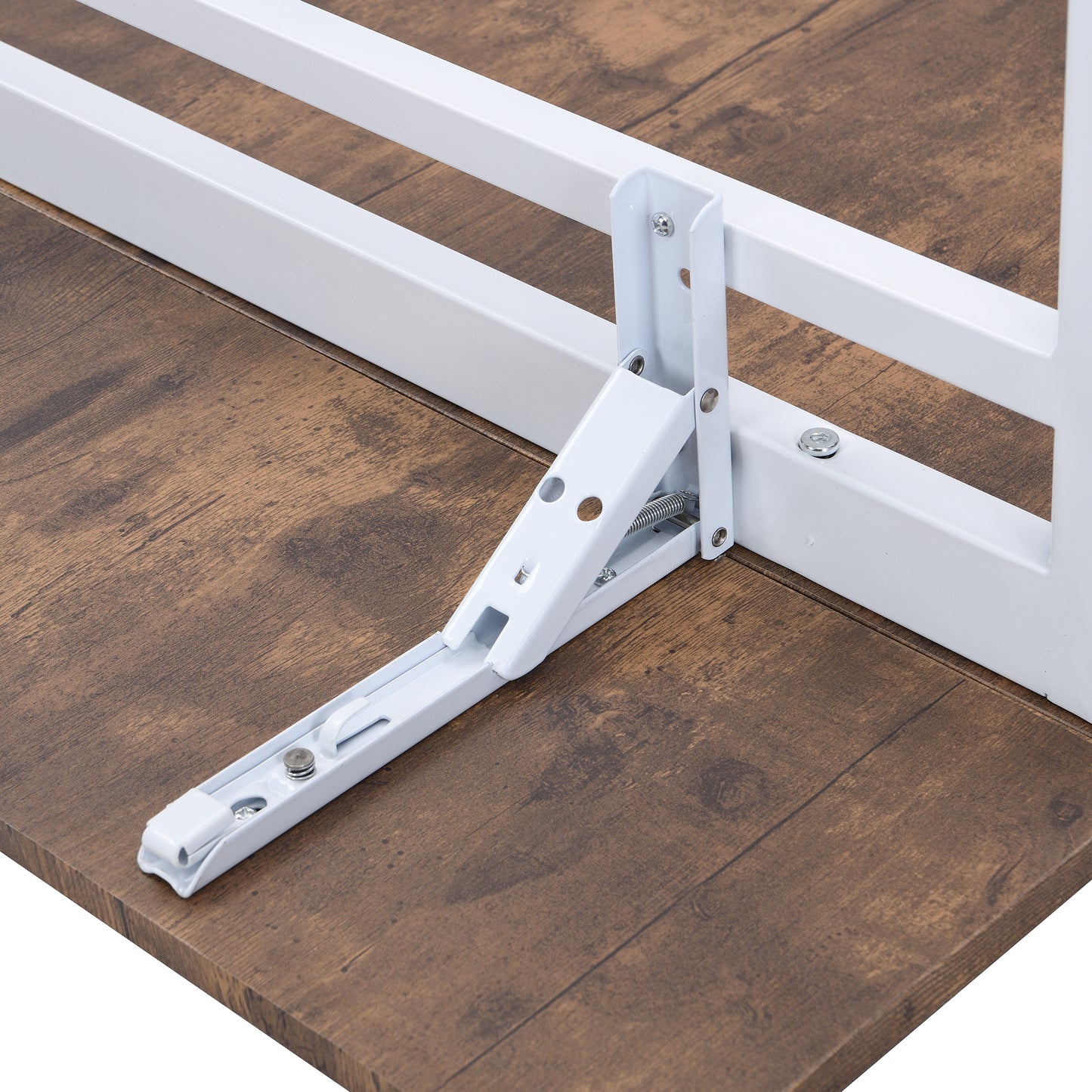 White metal folding shelf bracket mechanism attached to a dark wood surface