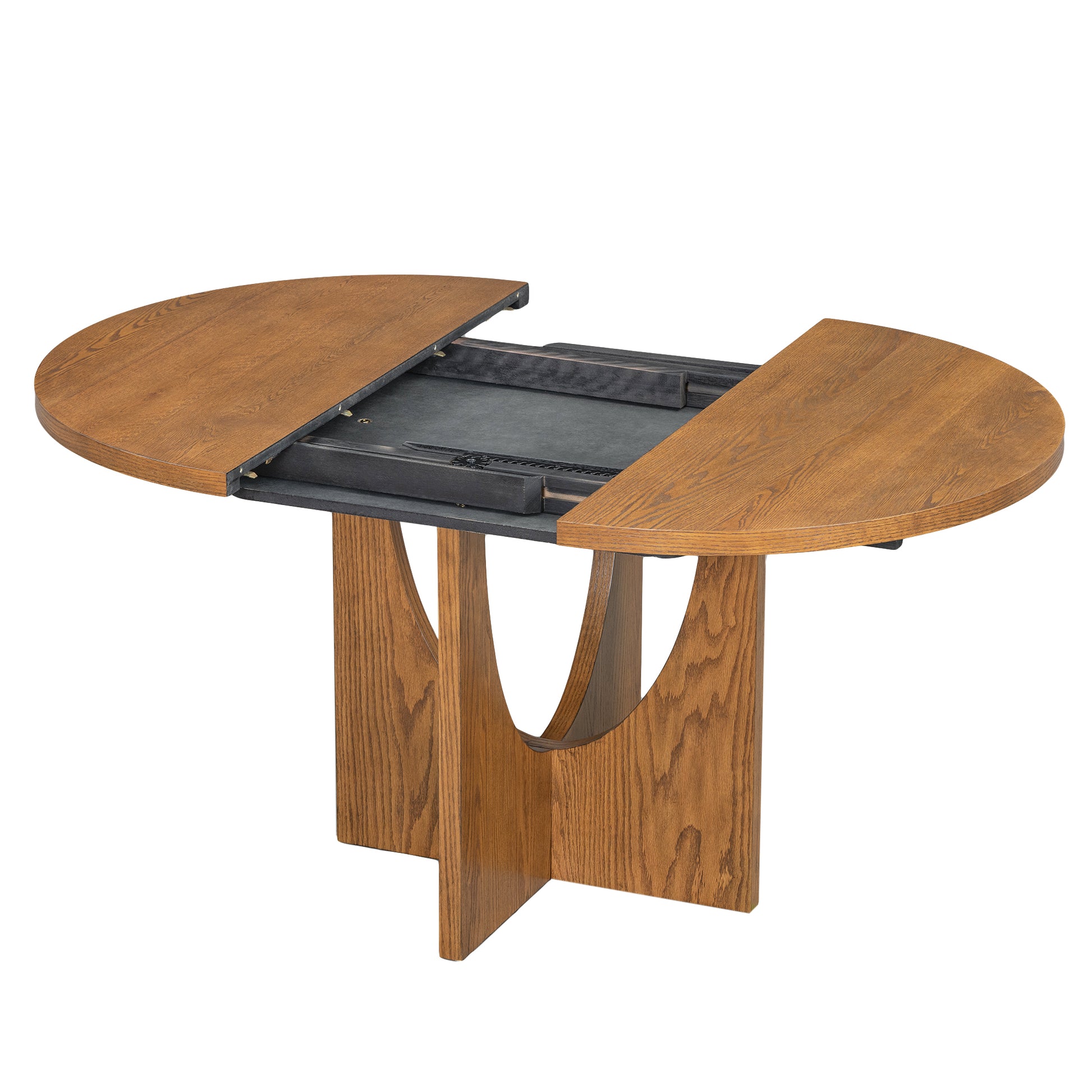 Round oak dining table extended with dark grey leaf mechanism
